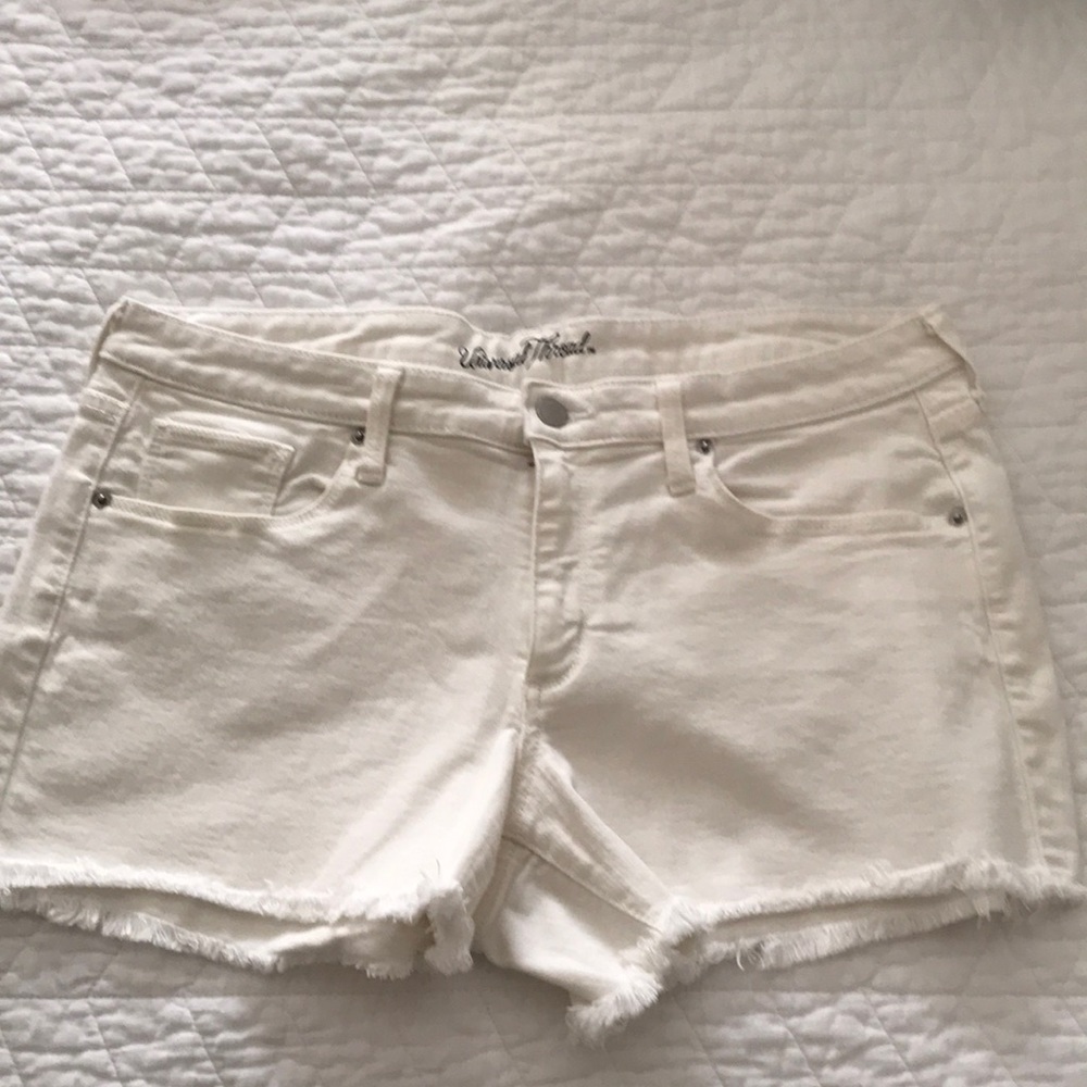 White cutoff denim shorts